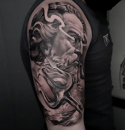 Half sleeve black and grey tattoo by Rick Shaw
