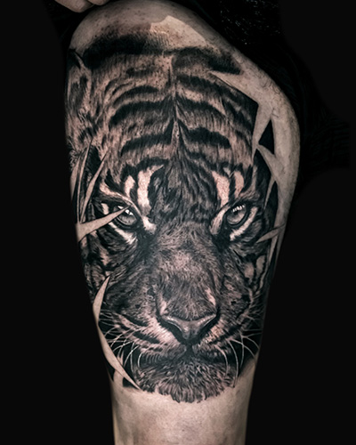 Tiger black and grey tattoo by Rick Shaw