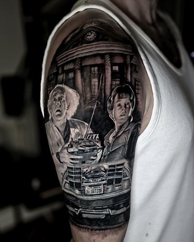 Back to the Future cover up tattoo by Rick Shaw