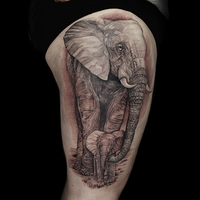 Elephant black and grey tattoo by Rick Shaw