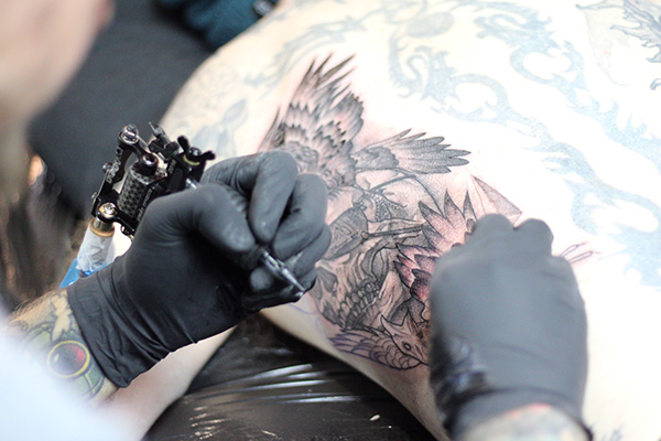 Rick Shaw tattooing close up